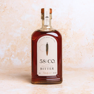 Bottle of 58 and CO Red Bitter on a light background