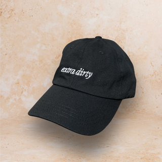 58 and CO Black cap with 'extra dirty' text on a beige background