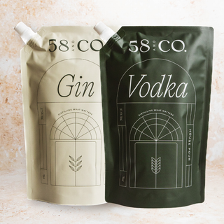 Two refill pouches labeled 'Gin' and 'Vodka' from 58 and CO House Pour on a light background