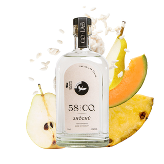 Bottle of 58 & Co. Shochu with fruit slices on a white background