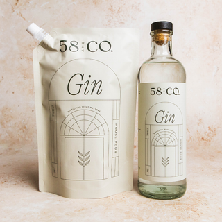 Bottle and refill pouch of 58 and Co House Pour Gin on a beige background