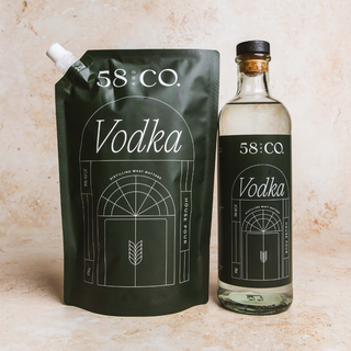 Bottle and refill pouch of 58 and CO House Pour Vodka on a textured background