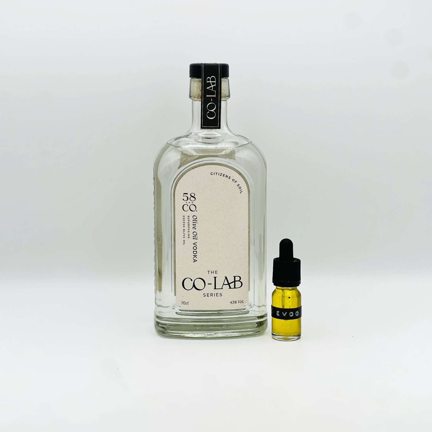 58 and CO CO-LAB Olive Oil Vodka Bottle with small bottle of extra virgin olive oil